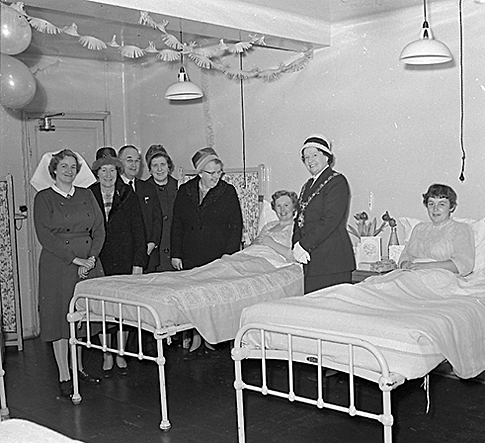 December 1960: The Mayor of Morley, Mrs Anne Clayton, and party visits new mums at Morley Hall maternity home