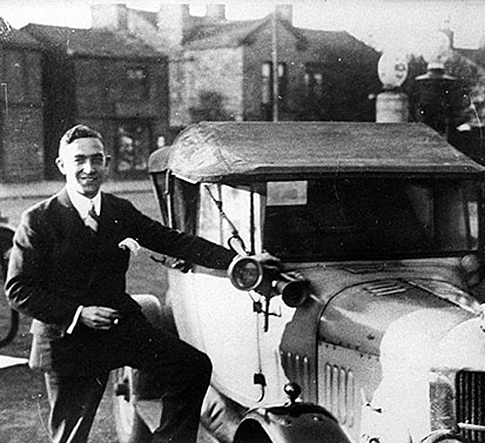 Leslie Overend pictured in the 1920s with one of his first cars.