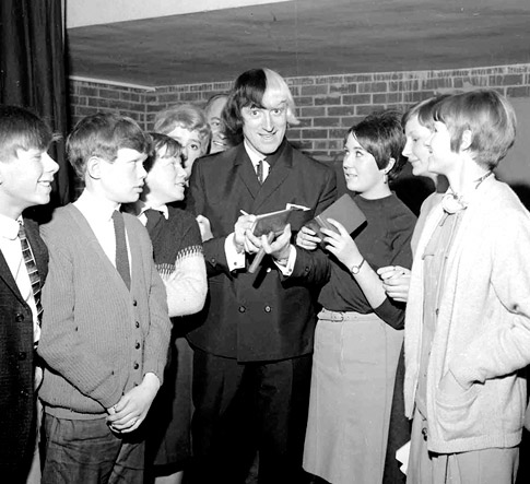 January 1966: Jimmy Savile meets members of East Ardsley Youth Club.